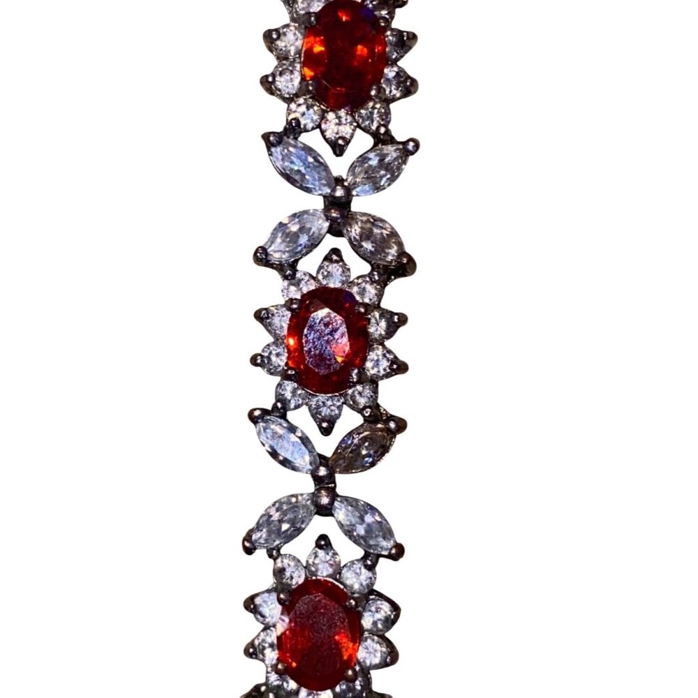 Elegant Silver & Red Gemstone Bracelet With Oval Cut Stones & Marquise Accents